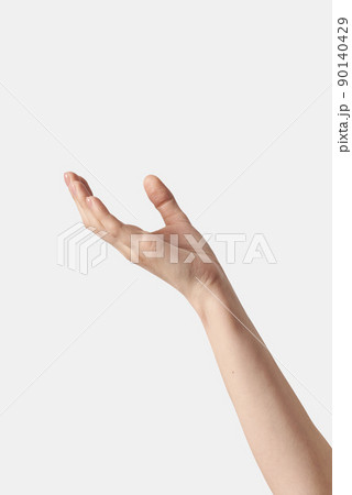 Close up raised female hand gesture on white. 90140429