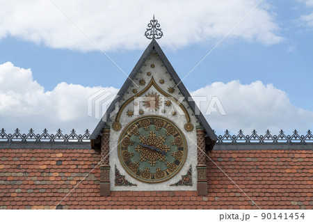 vintage clock in the tower on the roof close-up vintage clock in the tower on the roof close-up 90141454