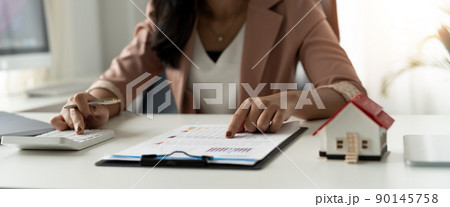 Businesswoman, financial accountants, planners, work, planning, ideas in the office, using the tools and calculators to work 90145758