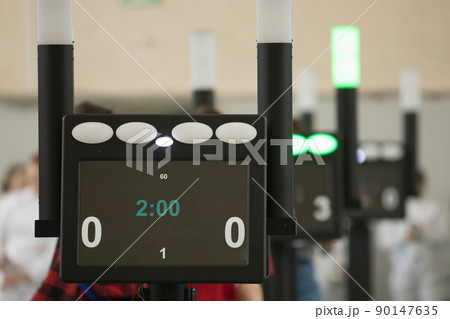 Fencing tournament. A counting electronic device standing in the hall Fencing tournament. A counting electronic device standing in the hall 90147635