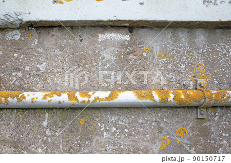 Metal pipe on the side of a bridge Metal pipe on the side of a bridge 90150717