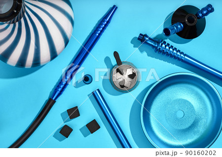 Top view of Hookah parts on light blue background 90160202