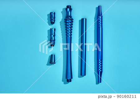 Top view of Hookah parts on light blue background Top view of Hookah parts on light blue background 90160211