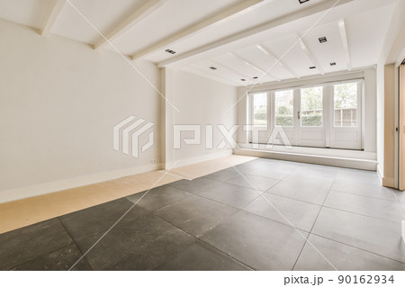 Plastic window and white wall in empty light room at home Plastic window and white wall in empty light room at home 90162934