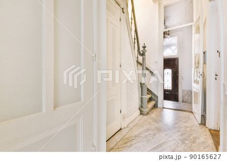 Entrance way with door and staircase side Entrance way with door and staircase side 90165627