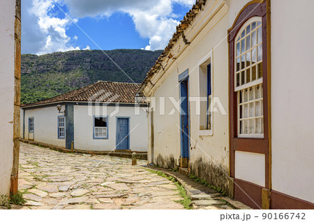 Old town street with historic colonial style houses in the city of Tiradentes Old town street with historic colonial style houses in the city of Tiradentes 90166742