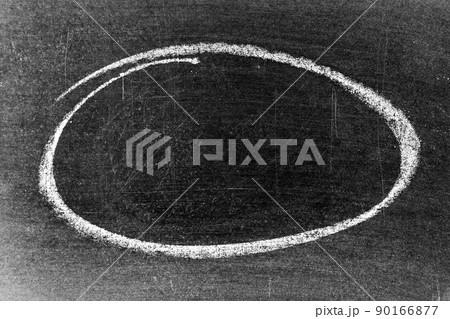 White chalk hand drawing as circle or round shape on blackboard or chalkboard background with copy space 90166877