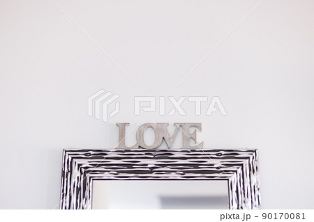 Letters forming word LOVE written on a white background. Copy space. 90170081