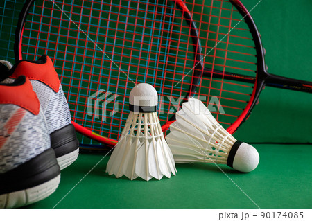 Badminton sports equipments, racket, shuttlecocks and shoes, on court, Badminton sports equipments, racket, shuttlecocks and shoes, on court, 90174085