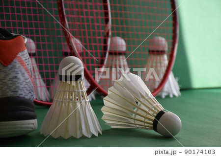 Badminton sports equipments, racket, shuttlecocks and shoes, on court, Badminton sports equipments, racket, shuttlecocks and shoes, on court, 90174103