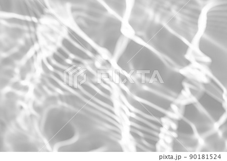 blurred shadow and light caustic effect on a white wall blurred shadow and light caustic effect on a white wall 90181524