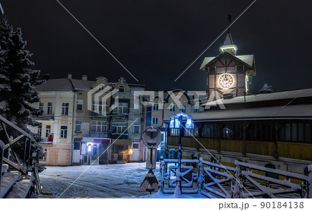 Detailed view of an ancient wooden town hall with an antique clock. Famous tourist place and a place for romantic travel. Popular tourist destination in Chortkiv, Ukraine 90184138