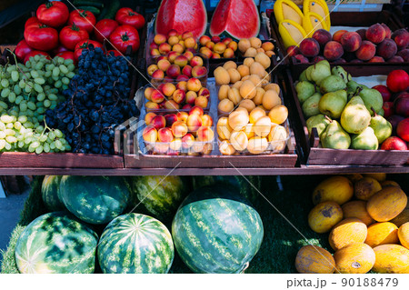 Fresh ripe fruits on the market in boxes Fresh ripe fruits on the market in boxes 90188479