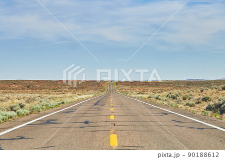Center of open road in desert landscape Center of open road in desert landscape 90188612