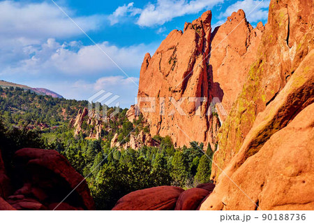 Landscape of red rocky mountain sheets of rock in forest Landscape of red rocky mountain sheets of rock in forest 90188736