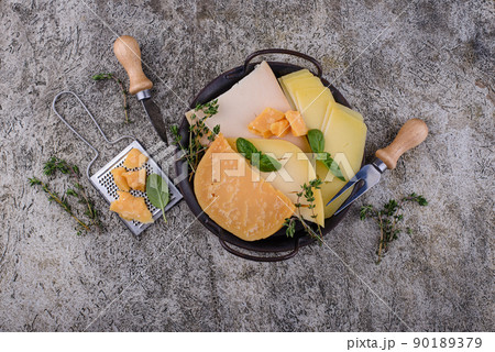 Parmesan, cheddar, gouda and maasdam cheese Parmesan, cheddar, gouda and maasdam cheese 90189379
