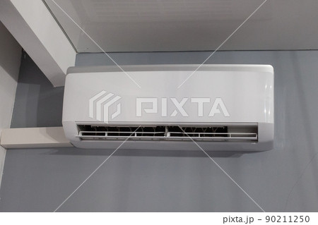 Air conditioner on gray wall room interior background Air conditioner on gray wall room interior background 90211250