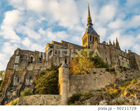 Impressive view of the famous Le Mont Saint Michel at sunset, Normandy, Northern France 90211729