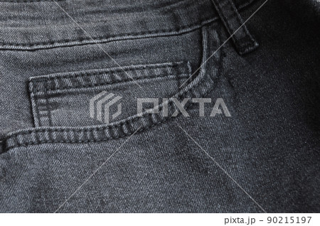 Close up detail of pocket of light black jeans Close up detail of pocket of light black jeans 90215197