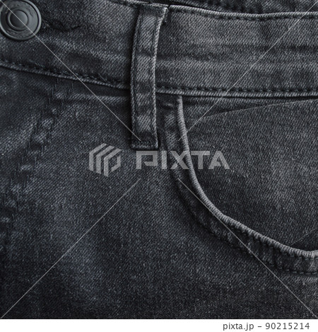 Zipper pocket and buttons close-up detail of light black jeans 90215214