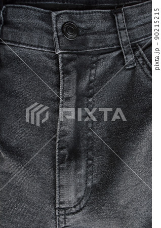 Zipper pocket and buttons close-up detail of light black jeans 90215215