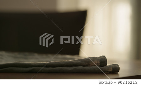 linen napkin on walnut table linen napkin on walnut table 90216215