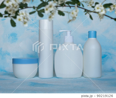 Bottles for cosmetic products without a label. Facial skin care concept. Texture background 90219126