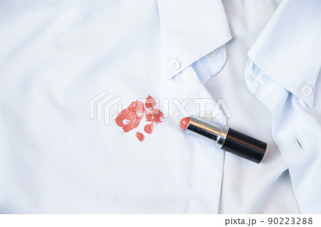 dirty lipstick stain on cloth from daily life activity for cleaning concept. housework care living  90223288