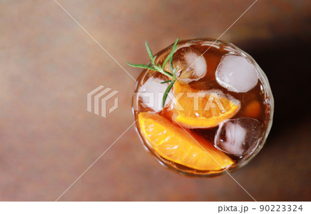 top view of iced Americano coffee mixed with orange for fresh drinking in free time 90223324