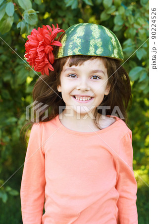 Funny female kid with watermelon. Summer child picnic. Kindergarden snack Funny female kid with watermelon. Summer child picnic. Kindergarden snack 90224526
