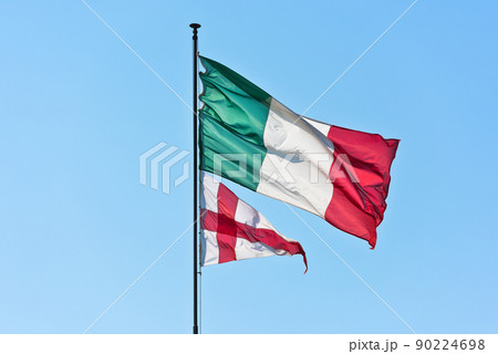 Flag of Italy and Flag of Genoa on sky background Flag of Italy and Flag of Genoa on sky background 90224698
