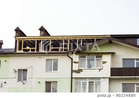 New residential construction home framing. Roofing framing of a new house under construction New residential construction home framing. Roofing framing of a new house under construction 90224880