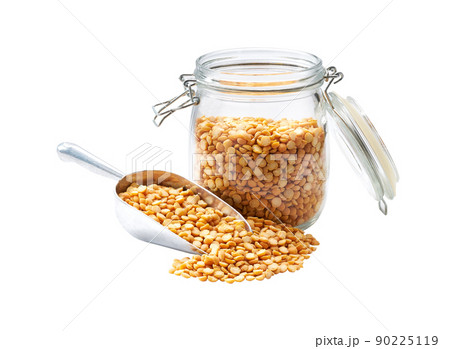 dried peas in metal scoop and in glass storage jar isolated on white background. dried peas in metal scoop and in glass storage jar isolated on white background. 90225119