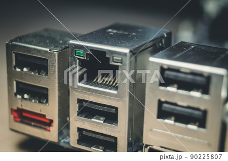 USB ports on the computer motherboard to connect peripheral devices. RJ-45 port for connecting an Internet cable. Selective focus 90225807