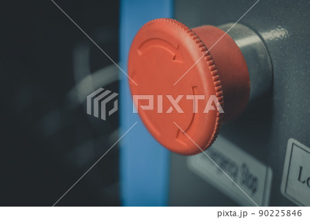 Emergency button. Large red emergency stop button for production equipment at the factory. Machine control. Equipment security system. Selective focus 90225846
