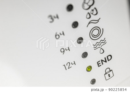 LED indicators of the included washing modes on the control panel of the home washing machine. Icons of washing modes. Selective focus 90225854