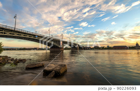 Beautiful sunset over Rhine / Rhein river and old bridge in Mainz near Frankfurt am Main, Germany. 90226093
