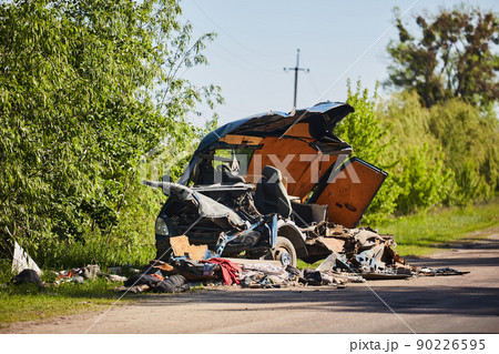 Burnt car of civilians. People were shot by Russian soldiers. May, 2022 90226595