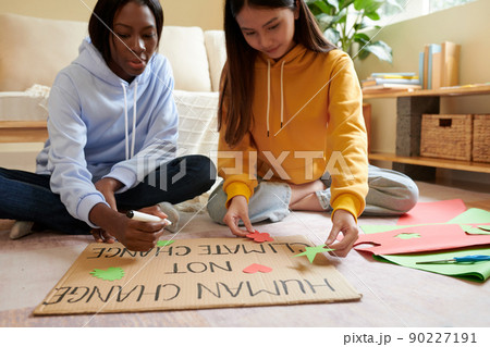 Teenage Activists Creating Placard 90227191
