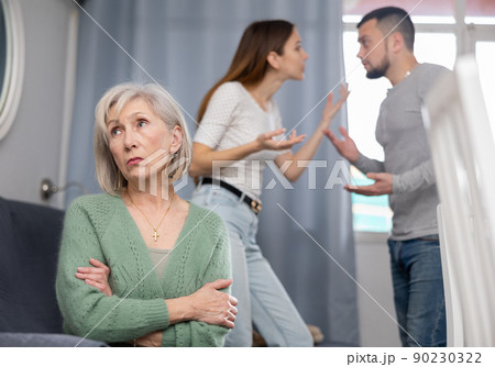 Offended mother dont speaking with adult children during home quarrel Offended mother dont speaking with adult children during home quarrel 90230322