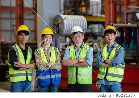 Group of engineer professional successful team corporate workers standing in factory. Group of engineer professional successful team corporate workers standing in factory. 90231277