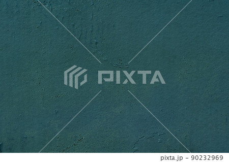 Green abstract background. Beautiful green textured stucco on the wall. Background from green stucco. Green abstract background. Beautiful green textured stucco on the wall. Background from green stucco. 90232969