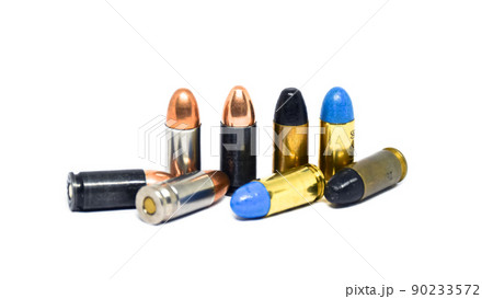 9mm pistol bullets and automatic gun. 90233572