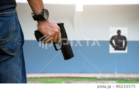 9mm pistol bullets and automatic gun. 9mm pistol bullets and automatic gun. 90233575