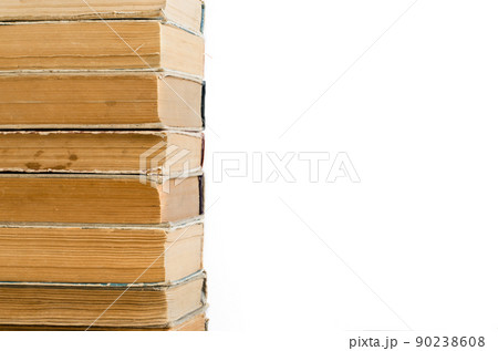 Old books with crumpled, torn covers. Isolated on white 90238608