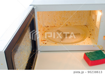 Open microwave. Dirt from food inside Open microwave. Dirt from food inside 90238613