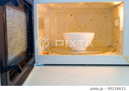 Open microwave. Dirt from food inside Open microwave. Dirt from food inside 90238615