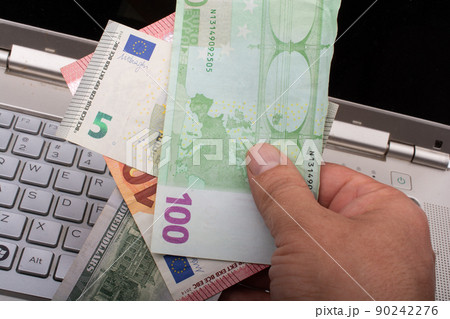 Hands holding cash euro banknotes currencies. Hands holding cash euro banknotes currencies. 90242276