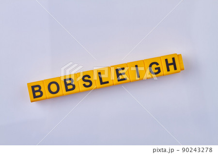 The inscription BOBSLEIGH written on yellow cubes. Copy space for text. The inscription BOBSLEIGH written on yellow cubes. Copy space for text. 90243278