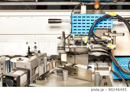 A fragment of power mechanisms with pneumatic drives of an automated machine for the production of cabinet furniture. A fragment of power mechanisms with pneumatic drives of an automated machine for the production of cabinet furniture. 90246495